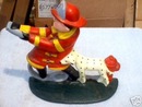 FIREMAN DALMATION DOORSTOP CAST IRON
