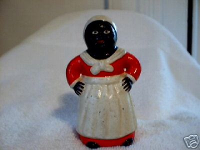 AUNT JEMIMA DIME BANK CAST IRON
