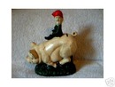 CAST IRON PIG BANK ELF RIDE