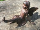 CAST IRON FAIRY HOLDING BIRD