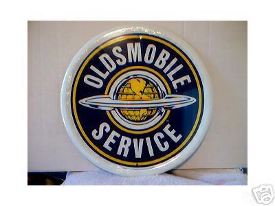 OLDSMOBILE ROUND TIN SIGN