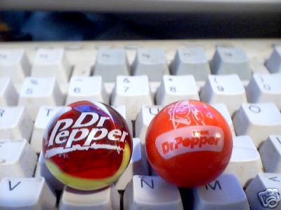 TWO DR. PEPPER LOGO MARBLES