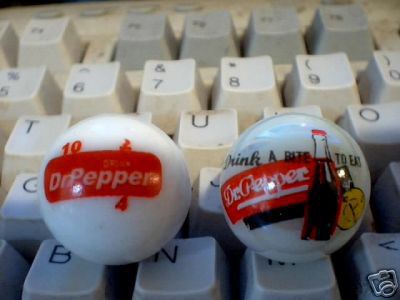 TWO DR. PEPPER LOGO MARBLES