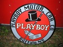 PLAYBOY MOTOR CAR CO HEAVY METAL SIGN