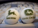 TWO JOHN DEERE MARBLES