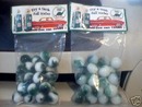 TWO BAGS OF SINCLAIR DINO MARBLES