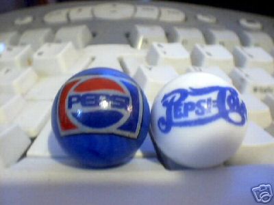 TWO PEPSI POP GLASS MARBLES