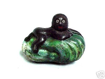 CAST IRON BOY ON CABBAGE