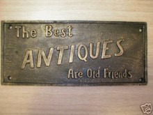 THE BEST ANTIQUES ARE OLD FRIENDS CAST IRON SIGN NR