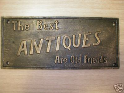 THE BEST ANTIQUES ARE OLD FRIENDS CAST IRON SIGN NR
