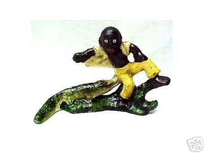 BOY ALLIGATOR OPENER CAST IRON