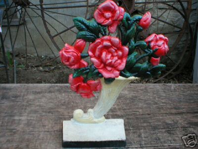 CAST IRON FLOWER DOORSTOP IOWA COLLECTORS ITEM NR