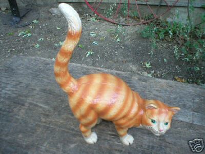 CAST IRON YELLOW-STRIPED CAT -