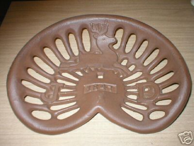 JACK DOITE CHILD'S TRACTOR SEAT CAST IRON
