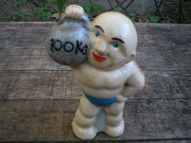 CAST IRON WEIGHT LIFTER BANK CHILDS TOY COIN BANKS