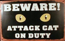ATTACK CAT ON DUTY TIN METAL SIGN