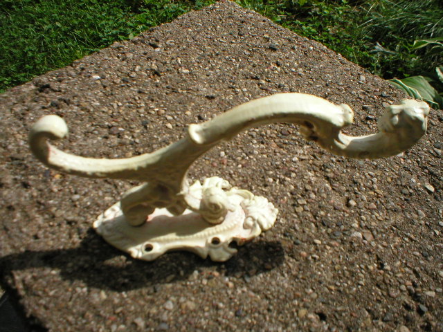 TWO LION'S HEAD ANTIQUE WHITE VICTORIAN HOOKS