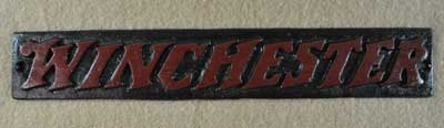 VINTAGE CAST IRON WINCHESTER SIGN GUN AMMO HUNTING MERCHANDISE SIGN