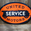 UNITED MOTORS PORCELAIN COAT SIGN