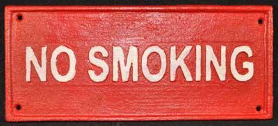 RED NO SMOKING SIGN CAST IRON