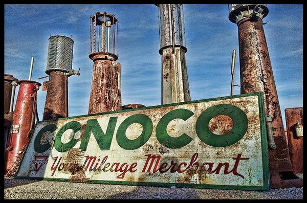 CONOCO YOUR MILEAGE MERCHANT old visible gas pumps HEAVY METAL sign