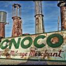 CONOCO YOUR MILEAGE MERCHANT old visible gas pumps HEAVY METAL sign