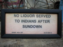 NO LIQUOR SERVED TO INDIANS AFTER SUNDOWN SIGN