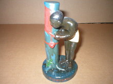 BLACK AMERICANA MAN WORKING ON RUBBER TREE FIRESTONE F