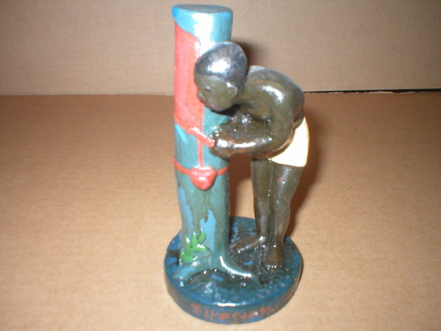 BLACK AMERICANA MAN WORKING ON RUBBER TREE FIRESTONE F