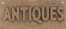 ANTIQUES SIGN ONE TAN VINTAGE STYLE CAST IRON