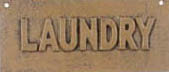 ONE TAN VINTAGE STYLE CAST IRON TAN LAUNDRY SIGN