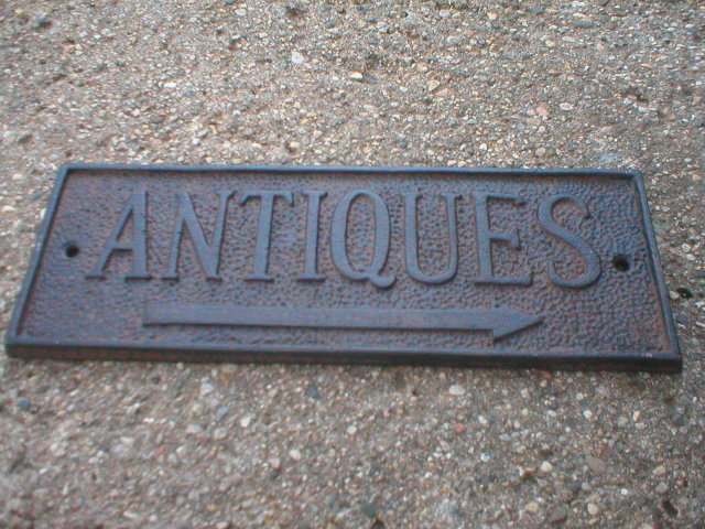 CAST IRON ANTIQUES SIGN METAL ADV SIGNS A