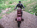 POLICEMAN ON MOTORCYCLE FRONT WHEEL CLACKER P