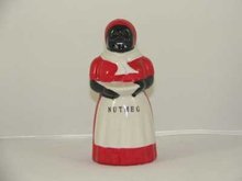 BLACK AMERICANA PORCELAIN HAND PAINTED MAMMY NUTMEG SHAKER
