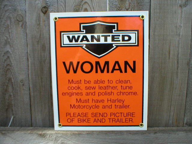 WANTED WOMAN PORCELAIN-COATED SIGN B
