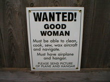 WANTED GOOD WOMAN AIRPLANE PORCELAIN-COATED SIGN T