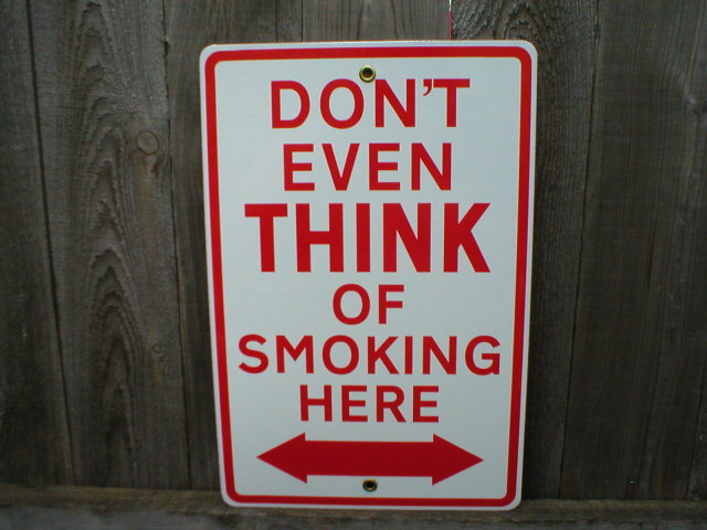 DON'T EVEN THINK OF SMOKING HERE PORCELAIN-COATED SIGN S