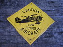 CAUTION LOW FLYING AIRCRAFT PORCELAIN-COATED SIGN O