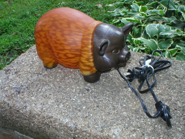 CAST IRON PIG LAMP AMBER GLASS BODY P