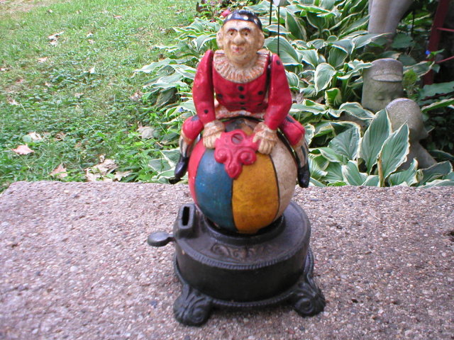 CAST IRON FLIPPING CLOWN MECHANICAL BANK C