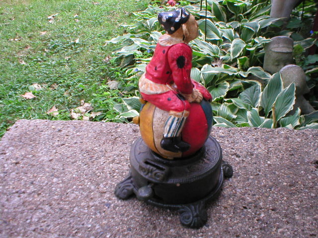 CAST IRON FLIPPING CLOWN MECHANICAL BANK C