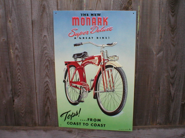 MONARK SUPER DELUXE BICYCLE TIN SIGN