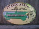 FILLING STATION CLEAN REST ROOMS TIN SIGN