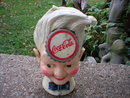 COCA-COLA SPRITE BOY STILL BANK CAST IRON