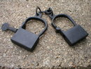 ANTIQUE VINTAGE STYLE CAST IRON HAND CUFFS H