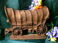 CAST IRON COVERED WAGON DOORSTOP