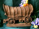 CAST IRON COVERED WAGON DOORSTOP