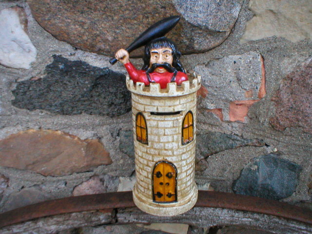 MAN ON TOWER COIN BANK CAST IRON DECOR