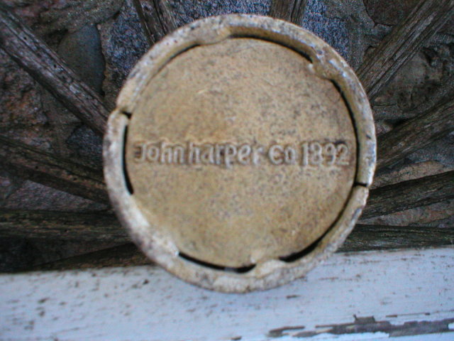 MAN ON TOWER COIN BANK CAST IRON DECOR