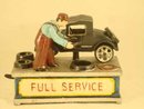 FULL SERVICE MECHANICAL BANK CAST IRON